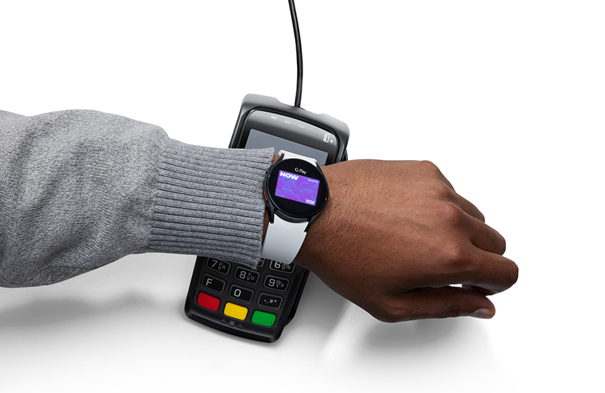 Person using Google Watch with NOW Rewards to pay at a eftpos terminal